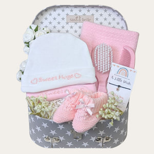 Baby girl gifts hamper with pink and white presents designed by Bumbles & Boo