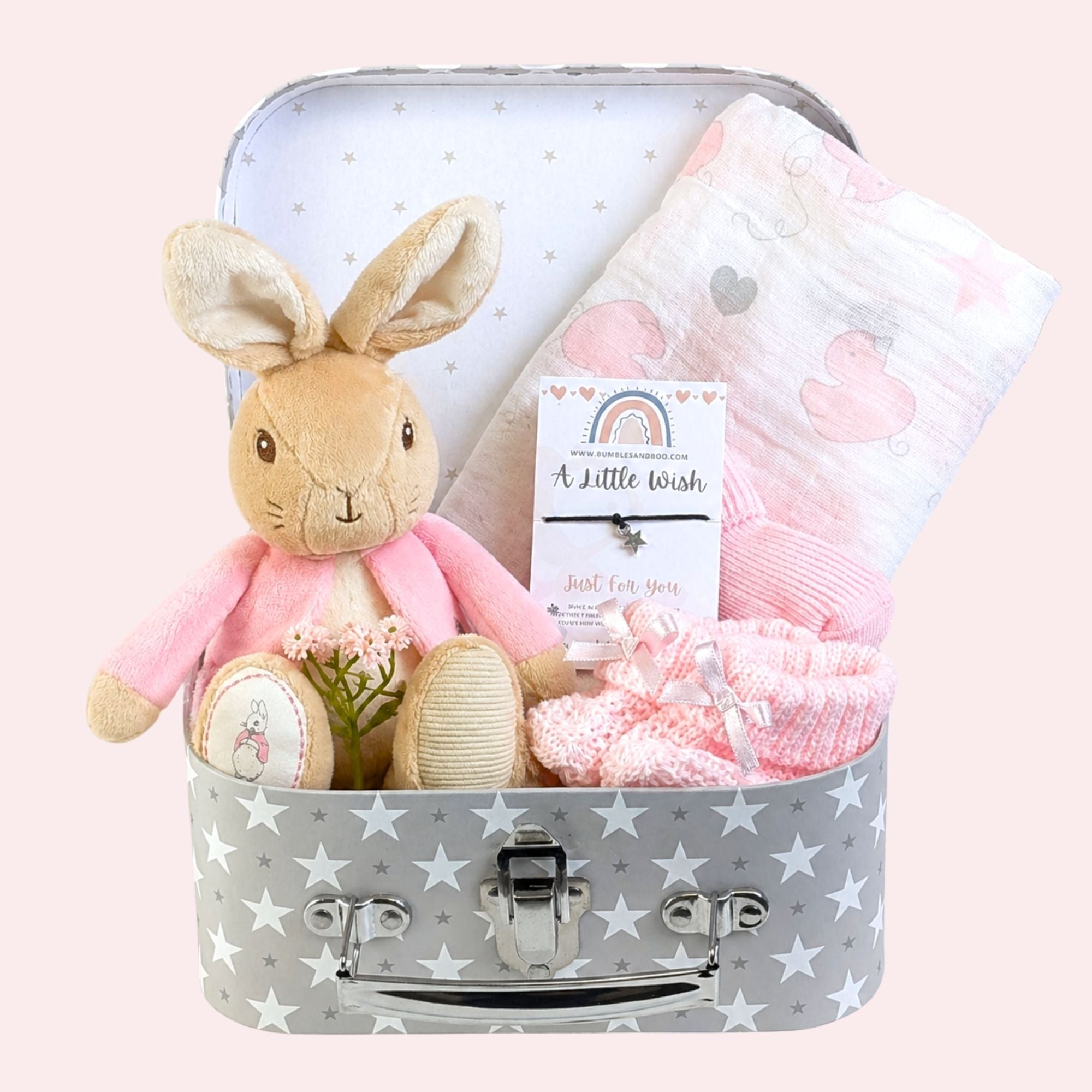 Baby girl gifts hamper with muslin square bunny soft toy baby booties baby socks and gift for mum.