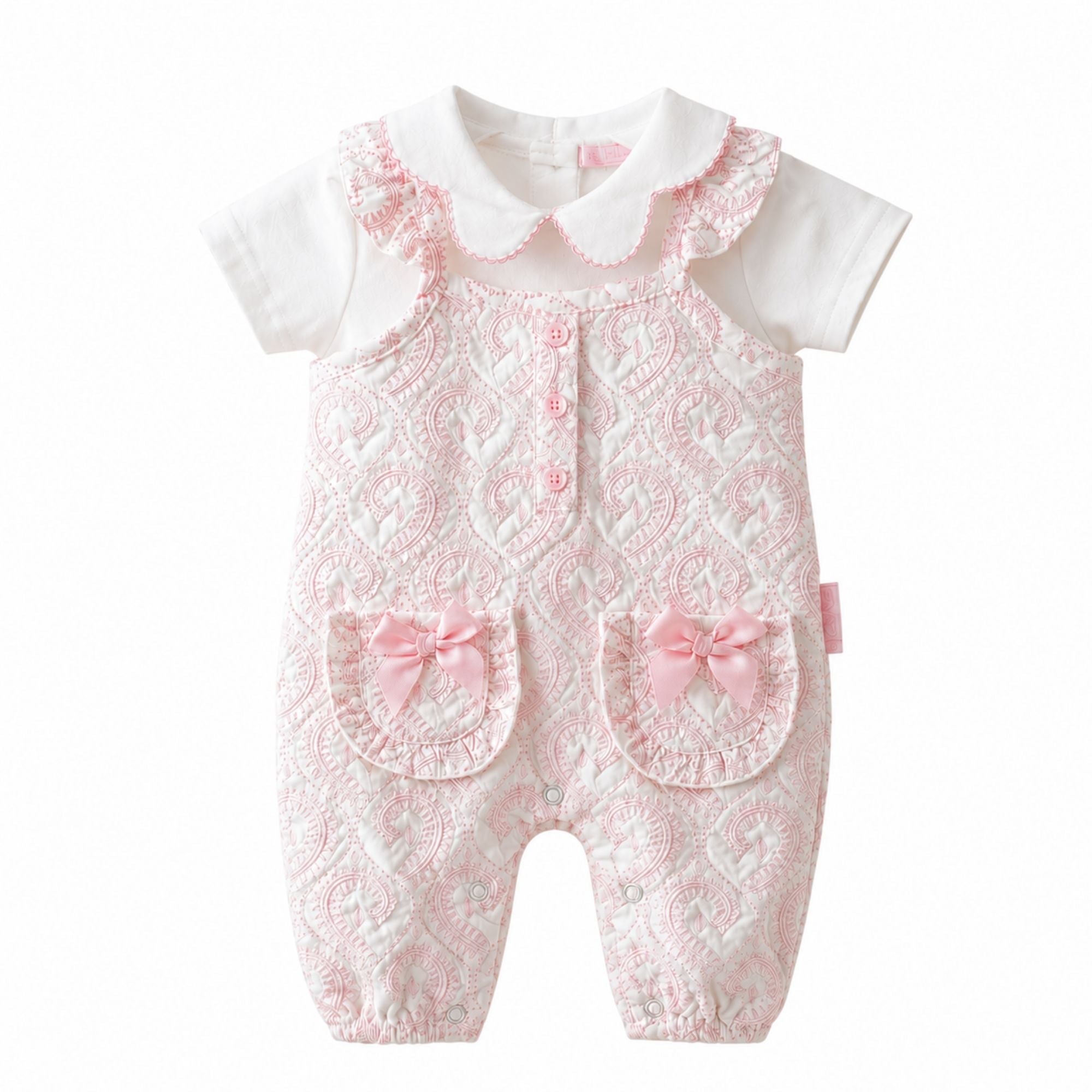 Set of baby rompers and a shirt with floral pattern on a baby