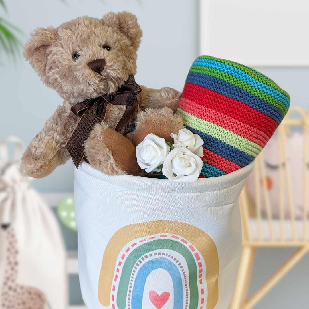 teddy and blanket baby hamper. colourful.