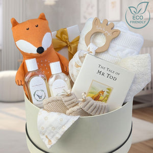 baby and mum gift hamper box with organic me fox, recycled baby blanket, mr tod baby story book and organic baby skincare.