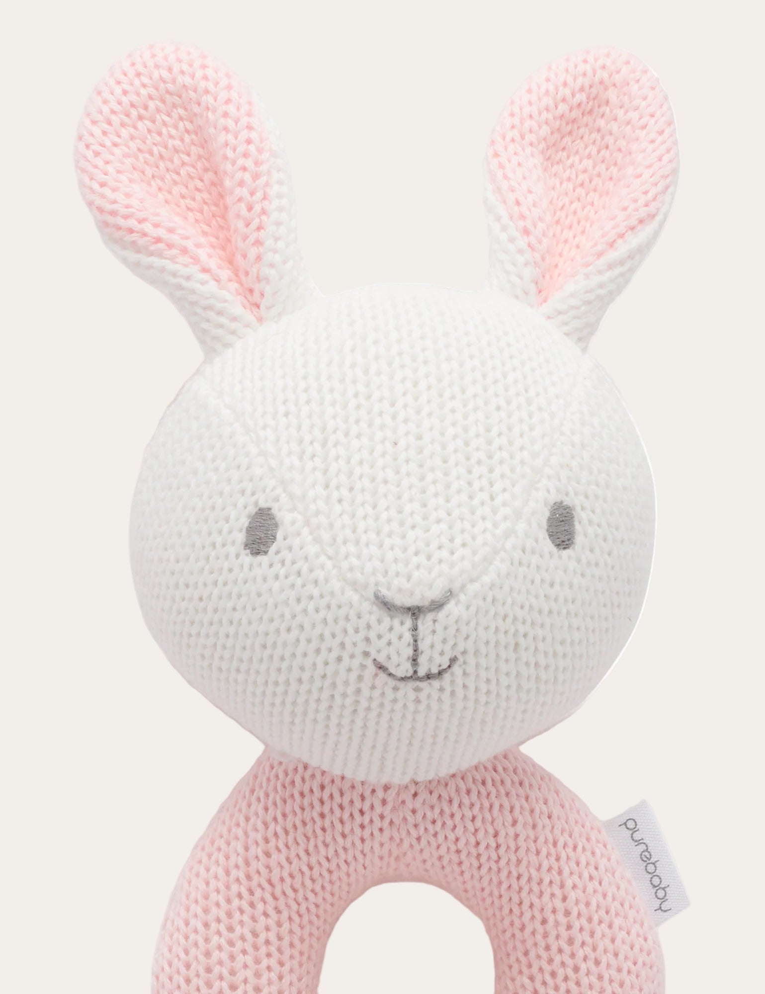 Handheld knitted rabbit rattle for little hands