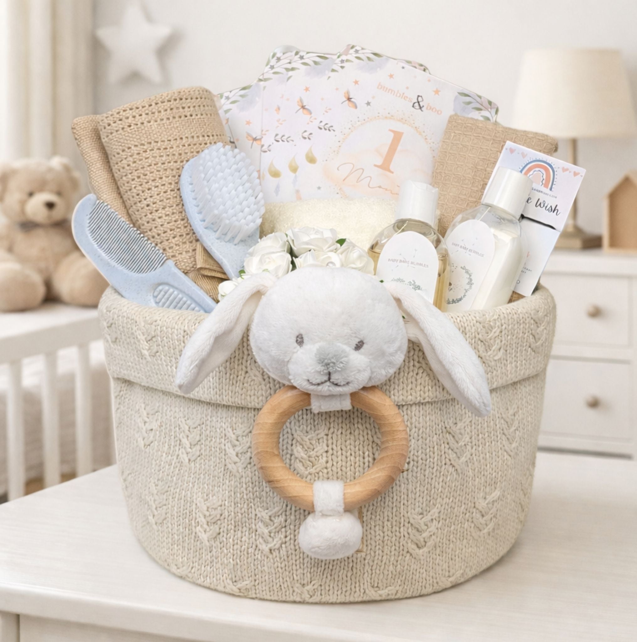 An organic baby shower hamper with a bunny theme and baby skincare.