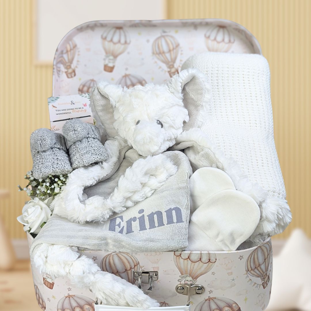 baby shower gifts trunk with elephant theme.