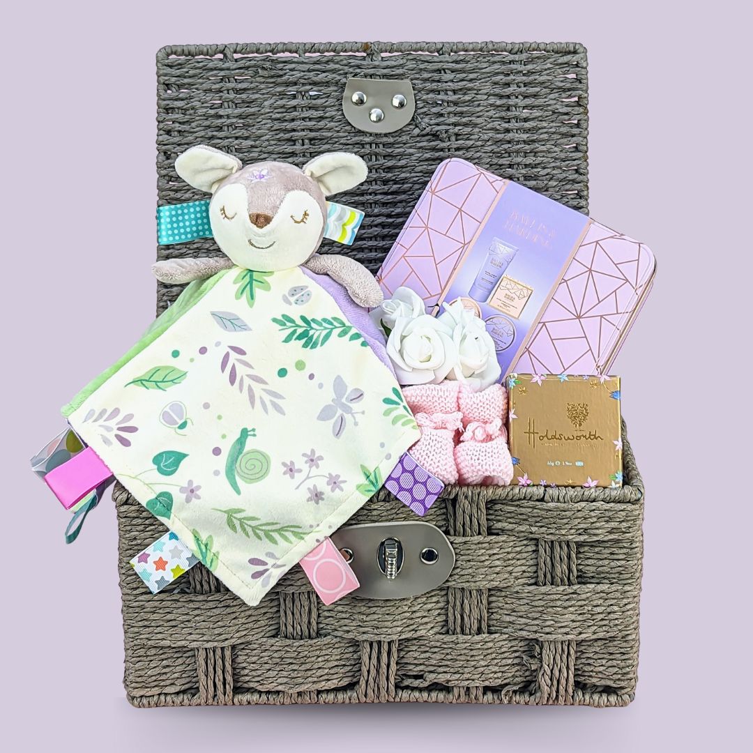 baby shower hamper with pamper tin for mum and gifts for the baby