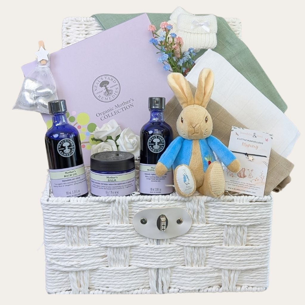 Luxury baby shower gift hamper featuring Organic Skincare Gifts Set for Mum to Be from Neals Yard and other treats and presents. Bumbles and Boo. 