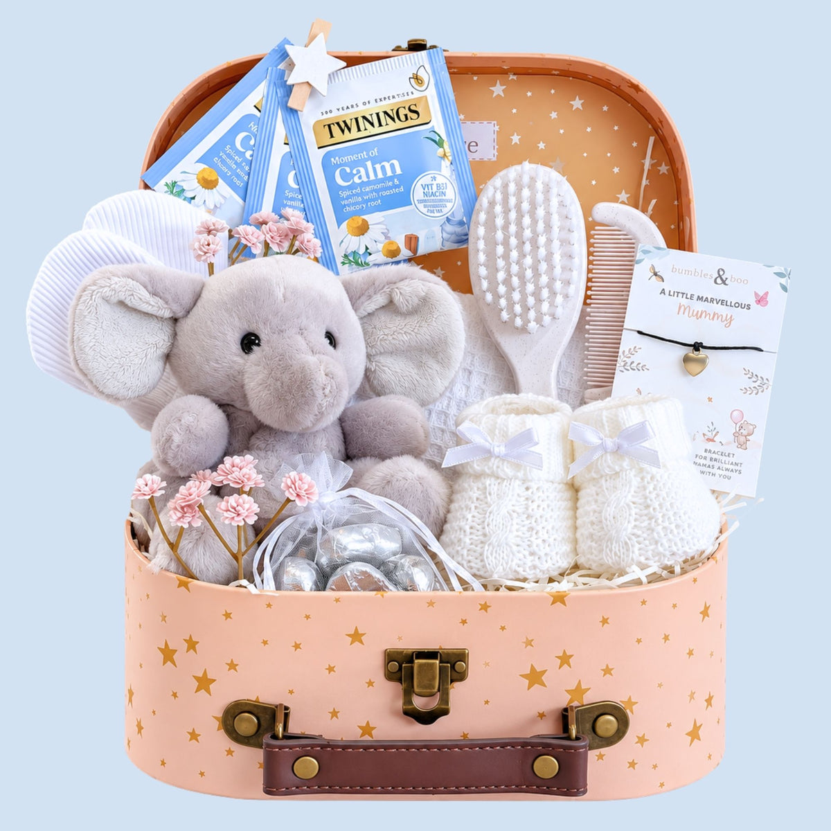 Small baby shower gifts hamper with soft elephant toy and indulgent presents for mum. Ideal baby shower present.