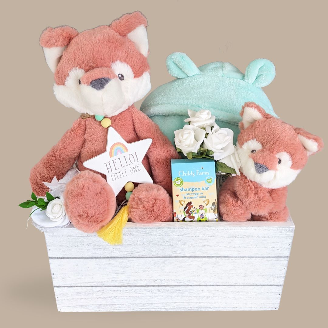 Baby shower gifts hamper with fox theme.