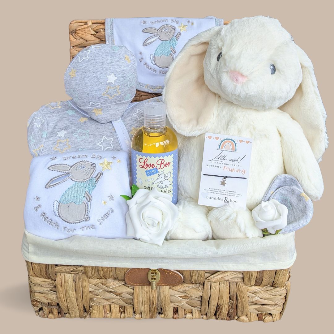 baby shower hamper gift with treat for mummy, clothing set and bunny rabbit.