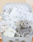 baby shower gift hamper with white and grey elephant themed baby clothing set.
