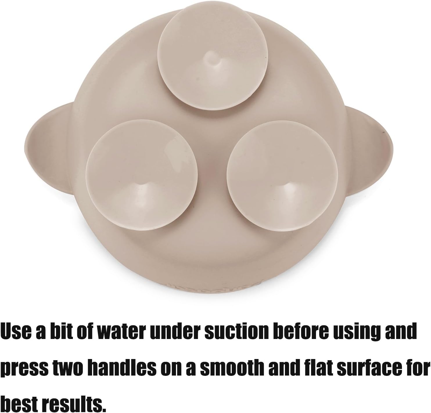 Beige silicone bowl underside with suction cups on a white background