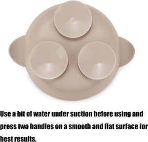Beige silicone bowl underside with suction cups on a white background
