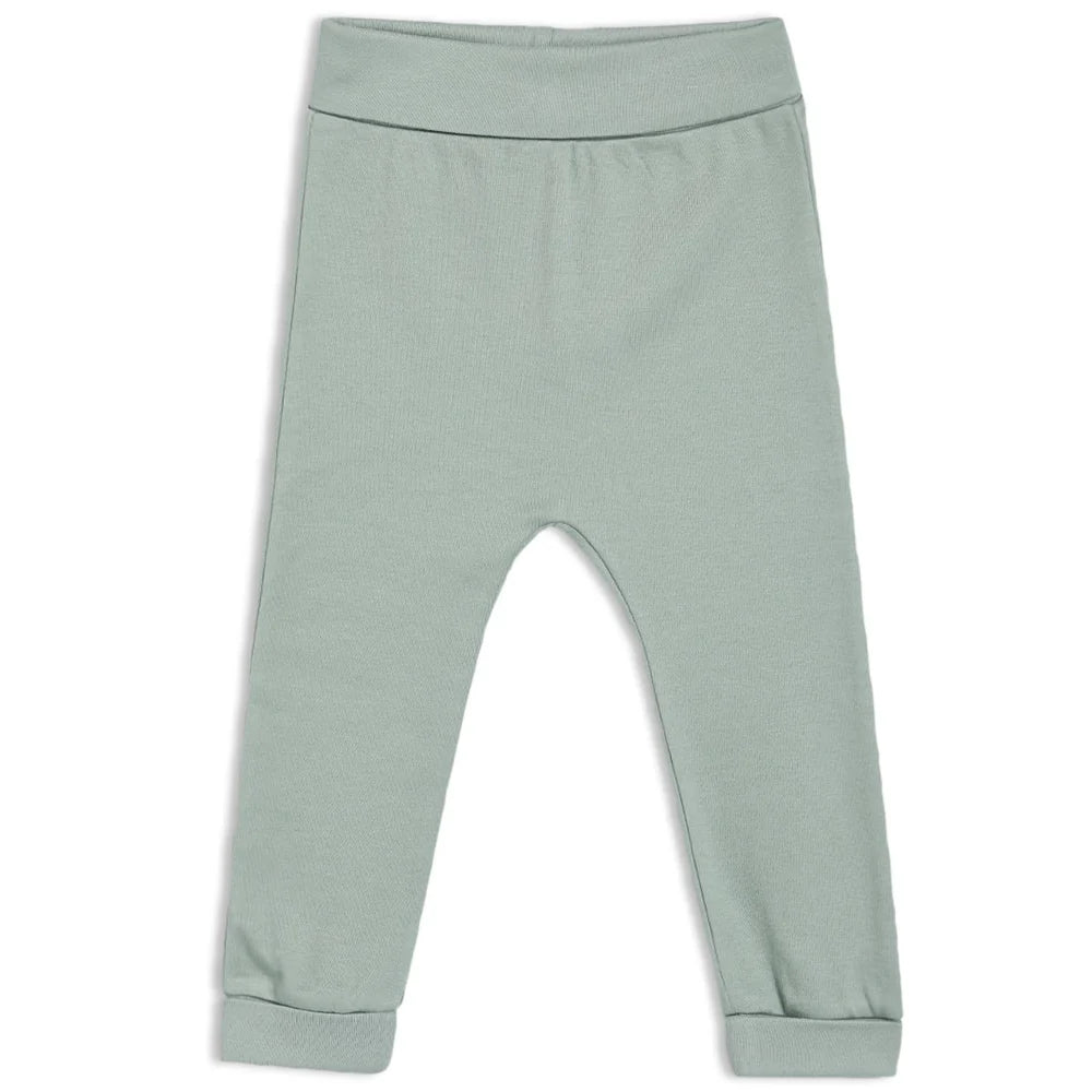 Baby unisex cotton joggers in soft green with elasticated waist