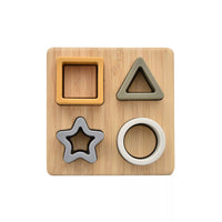 Neutral bamboo baby shape puzzle with four silicone shaped pieces. Square, circle, triangle and star