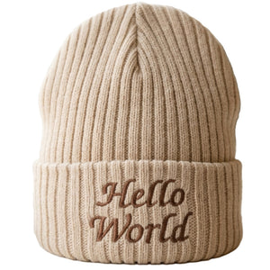 A beige ribbed knit beanie hat with the words 'Hello World' embroidered in brown on the front cuff, shown against a plain white background.