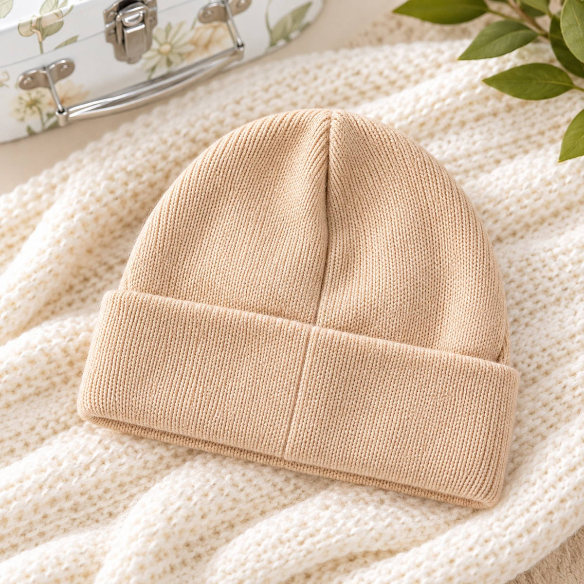 Beige knitted baby hat 