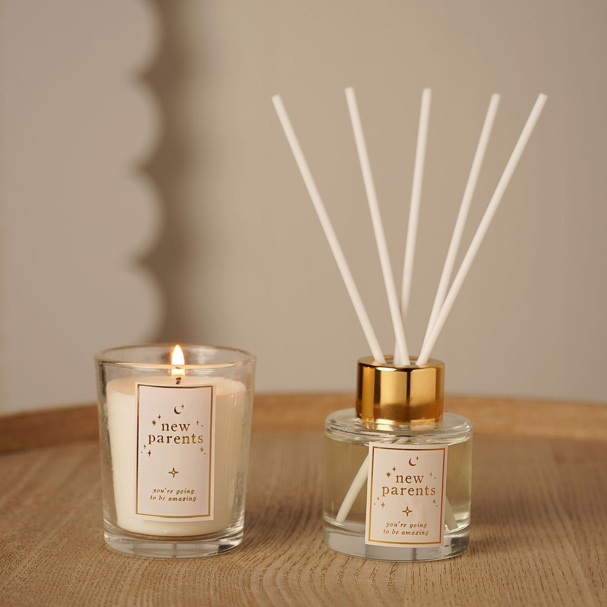 New parents candle and diffuser set with bergamot and pink pepper fragrance