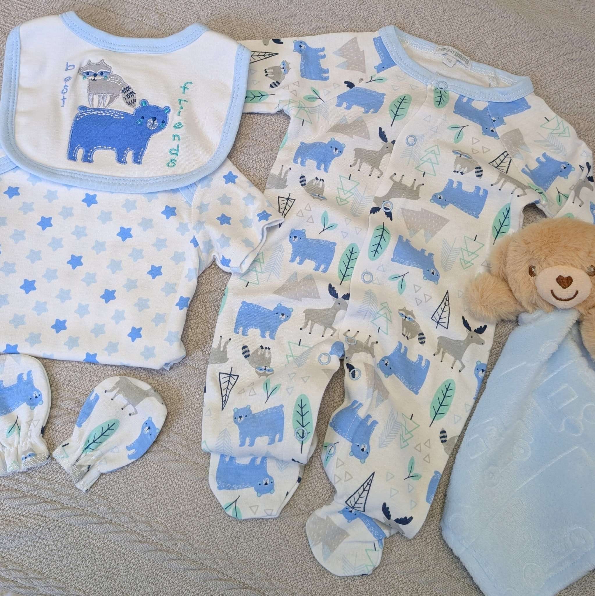 Baby boy clothing gift set in blue and white with a bear
