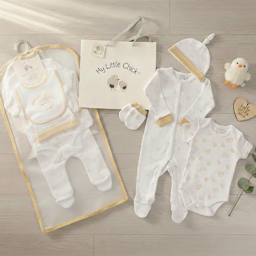 Biscuit and white baby clothes set in 100% cotton including sleepsuit, bodyvest, bib, hat and mittens for newborn babies
