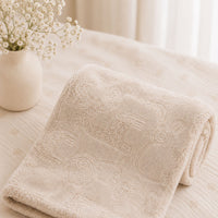 Blanket wrap in soft biscuit with safari animal print