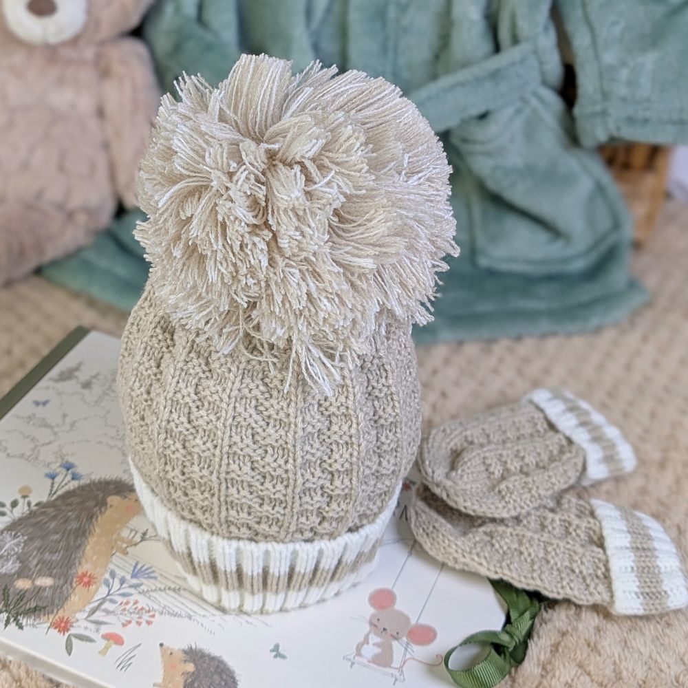 Knitted hat and mittens set in biscuit colour with a pompom