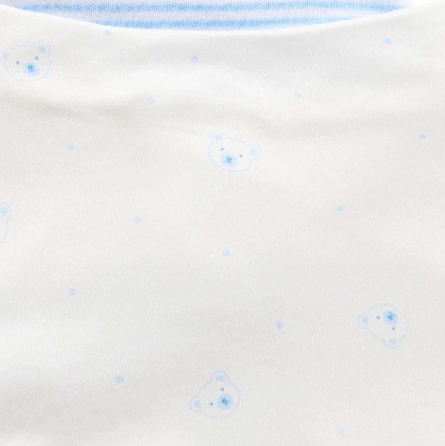 Close up of blue bear dribble bib in soft organic cotton