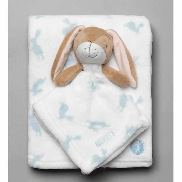 White blanket with blue bunny pattern and a matching bunny comforter.
