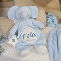 Personalised blue comforter for a baby with a teething ring in an elephant design.
