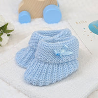 Blue plain knit baby booties, suitable from newborn to six months with side bow detail. 
