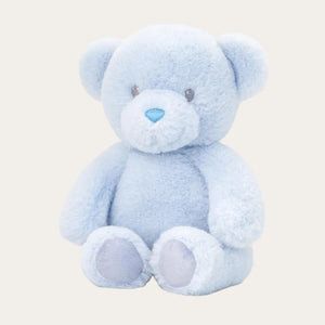 blue teddy bear soft toy sitting upright