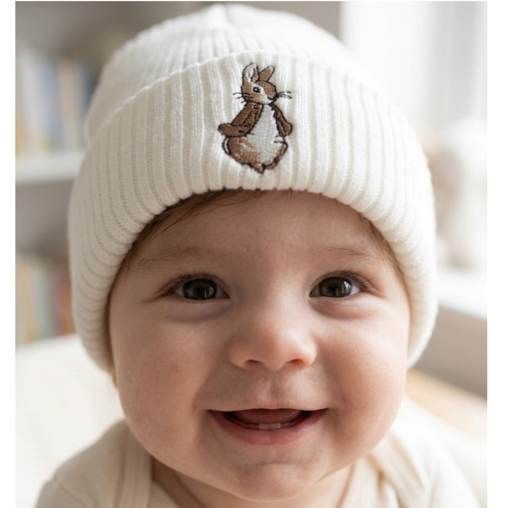 Brown knitted baby hat with embroidered bunny detail for newborns 0-3 months