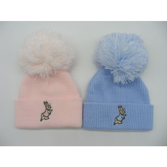 Soft knitted pom pom hat with an embroidered bunny on the front turn up available in a range of colours.