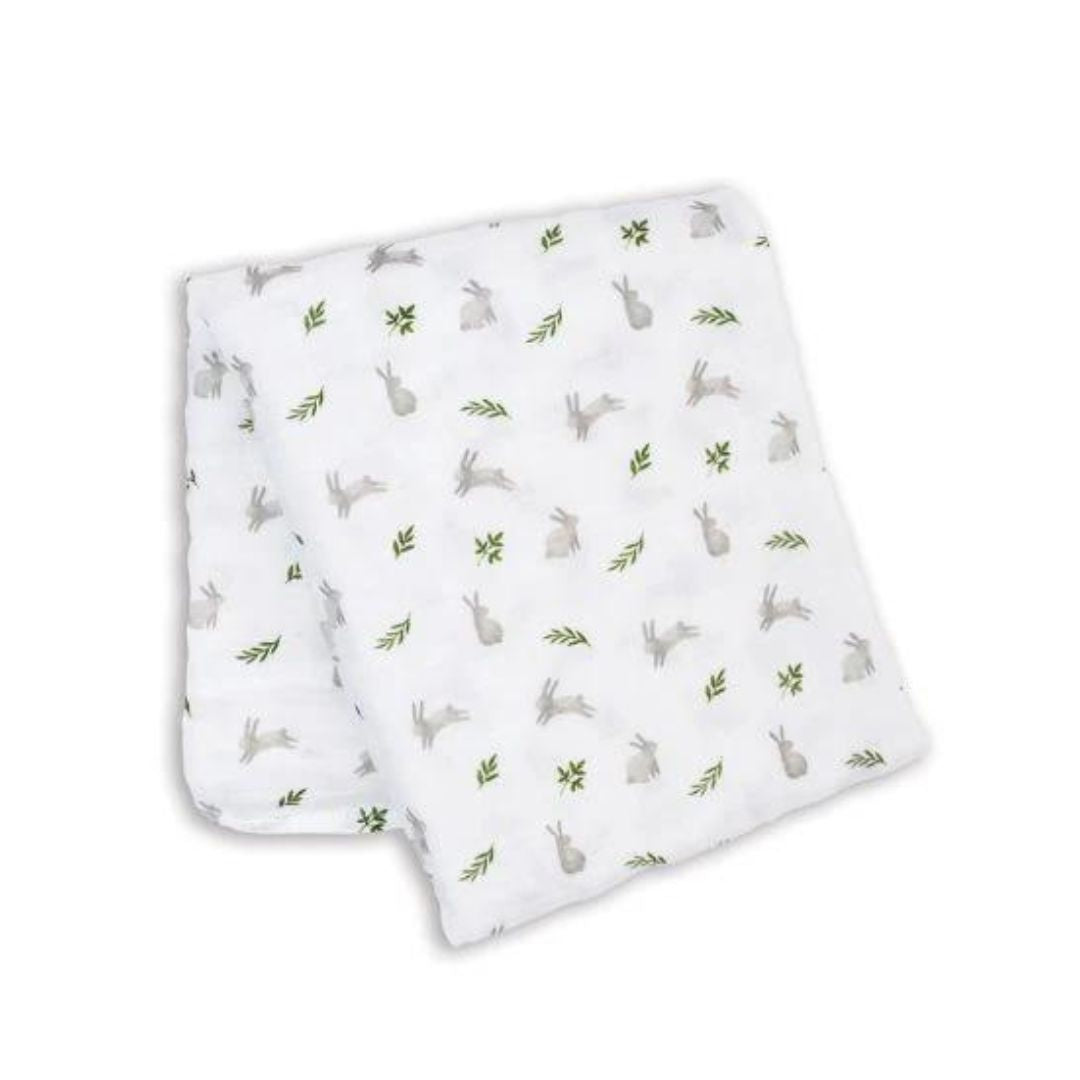 Large white muslin swaddle blanket with bunny and green leaf print