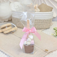 Marshmallow and chocolate treat in a clear wrapper with a pink bow.