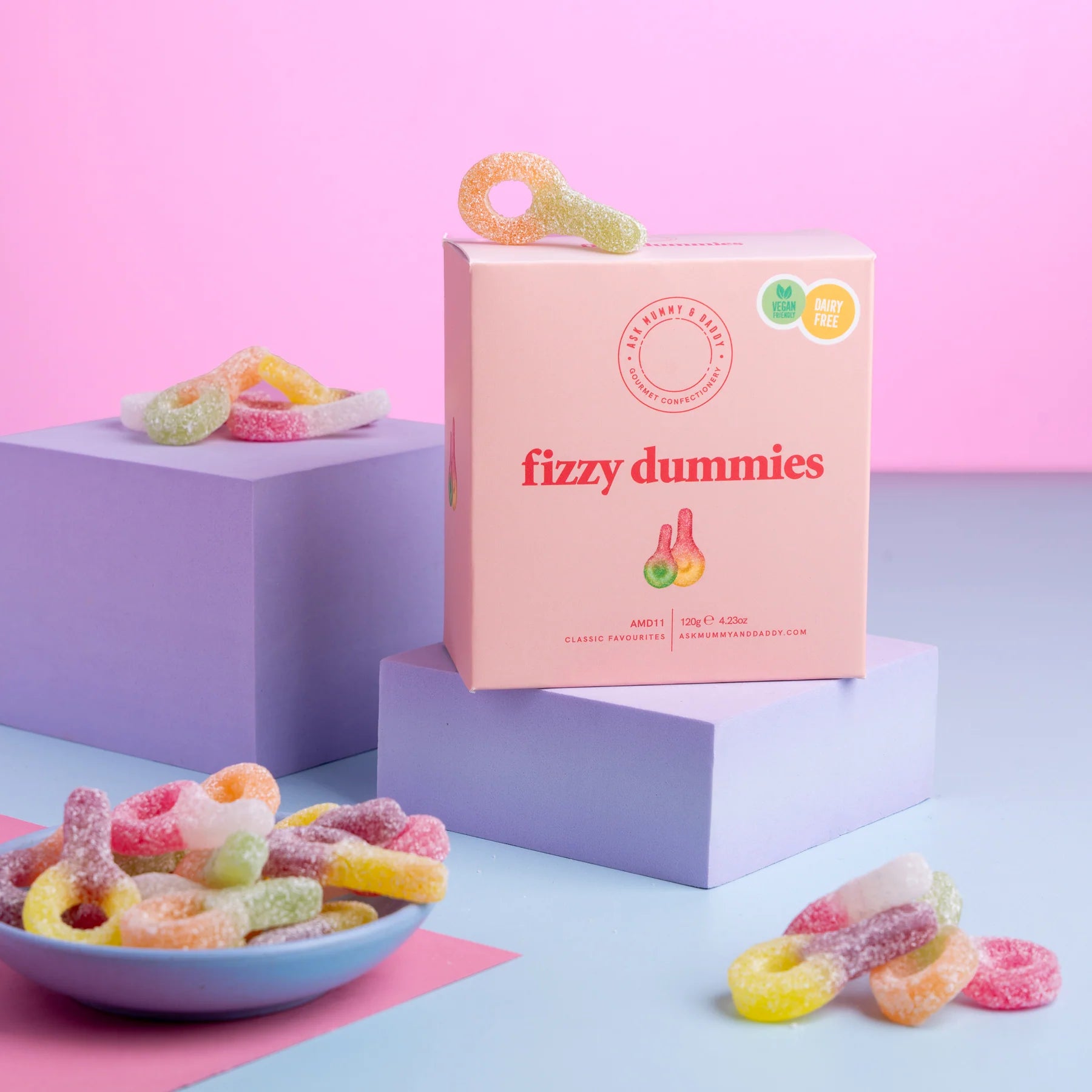 Colourful fizzy dummy-shaped gummy sweets