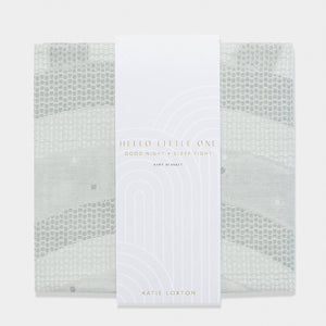 Katie Loxton cool grey baby blanket folded with printed sleeve packaging on top.