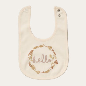 Cream baby bib with 'hello' printed in a circle of leaves