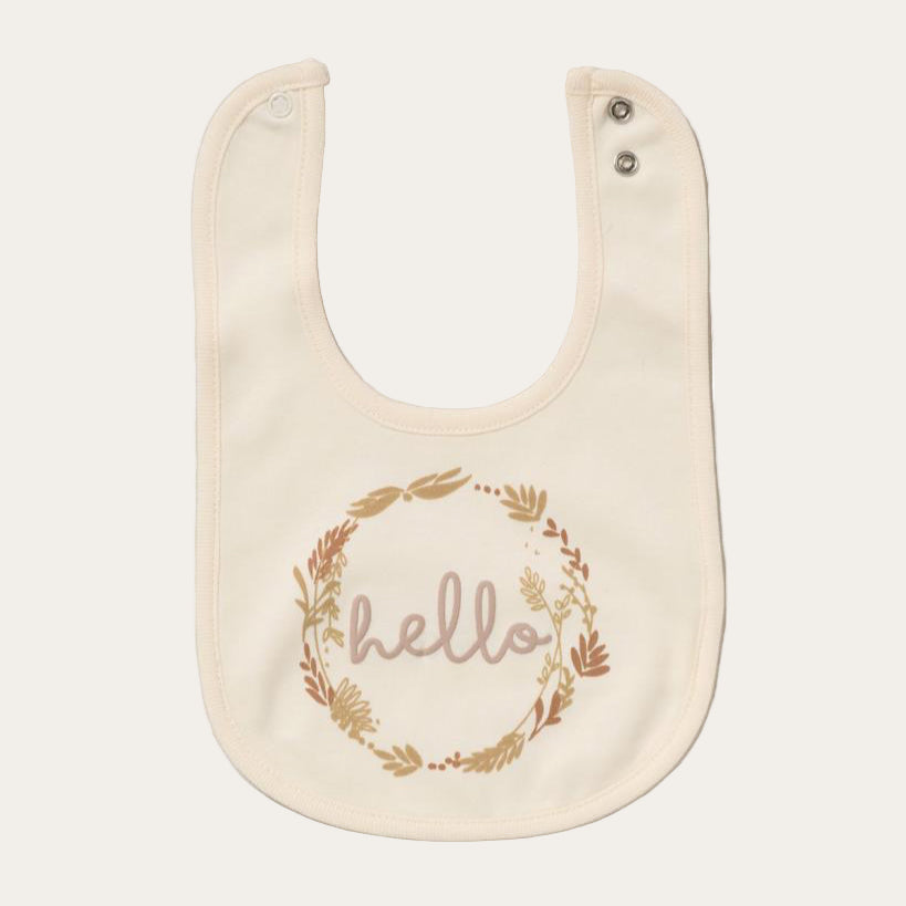 Cream baby bib with 'hello' printed in a circle of leaves