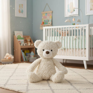 Cream Putty Soft Toy Teddy Bear medium teddy bear baby toy with soft textured plush fabric, floppy body and neutral cream colour