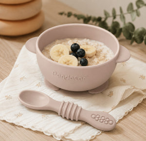 Silicon baby bowl and spoon in cream with suction pads