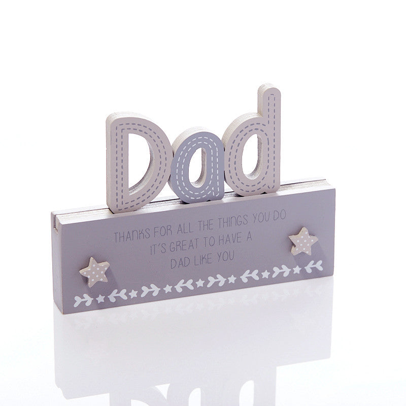A grey freestanding plaque 'Dad'. A free standing 'Dad' plaque with the sentiment wording   'Thanks for all the things you do.  It's great to have a dad like you'