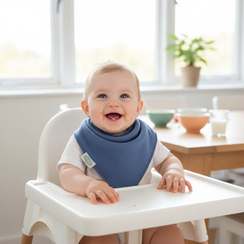 Dark blue baby bandana bib with soft cotton front and fleece backing, designed to absorb dribble and keep baby clothes dry.