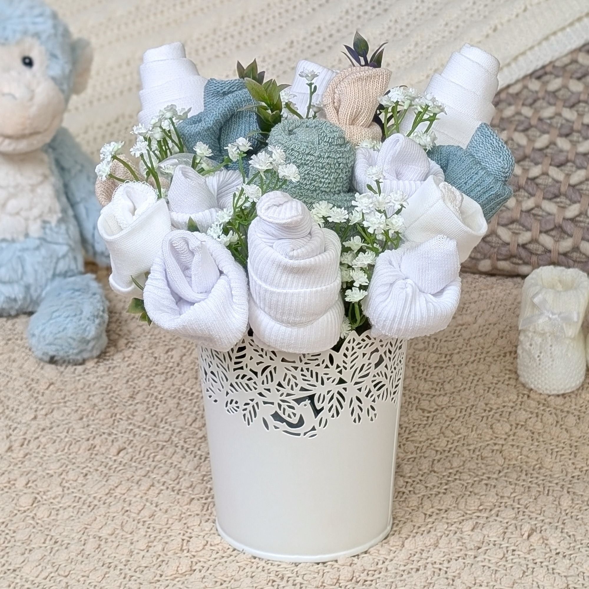 New baby clothes flower gifts bouquet with with neutral toned blooms by Bumbles and Boo. Perfect present for New Mums and Parents. 
