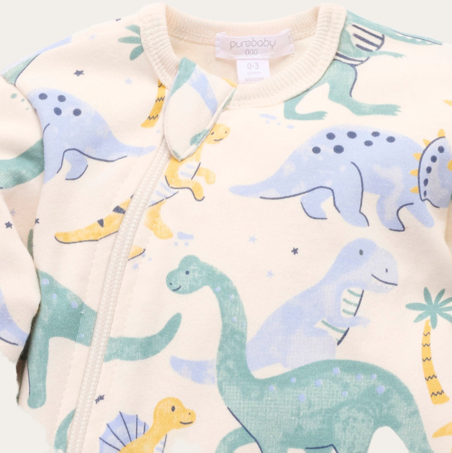 Side view of Dino Print Organic Baby Onesie