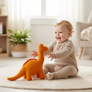 Large orange diplodocus dinosaur baby rattle soft toy