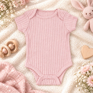 Dusky pink ribbed baby bodysuit 0-3 months with short sleeves