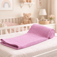 Dusty pink cotton cellular baby blanket folded, 70 x 90 cm