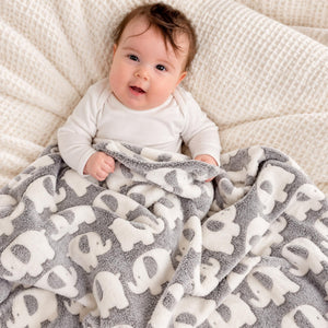 Baby blanket with white and grey elephant design