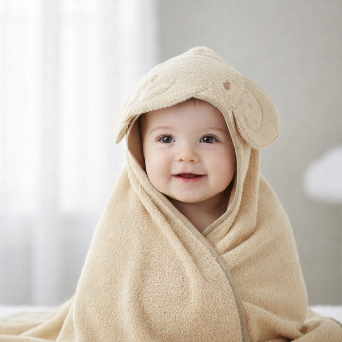 Taupe elephant hooded baby towel laid flat, 100% cotton hooded towel with elephant face detail, size 75 x 75 cm.