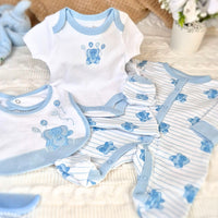 Blue and white baby boy clothes set with elephant design.
